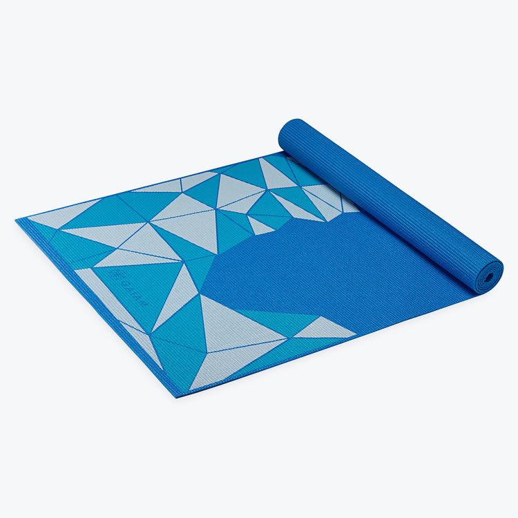 Gaiam Kids Blue Rocket Yoga Mat 3 millimeter half rolled side